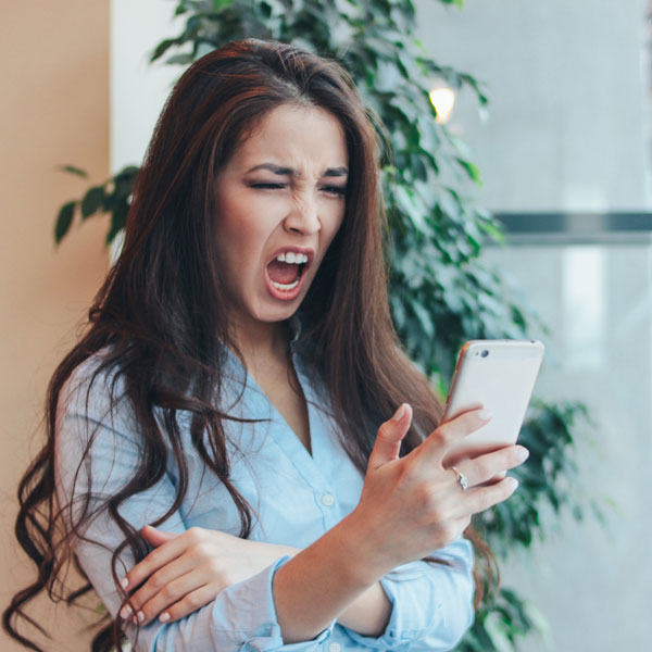 Emotional Abuse Trauma woman screaming at her phone
