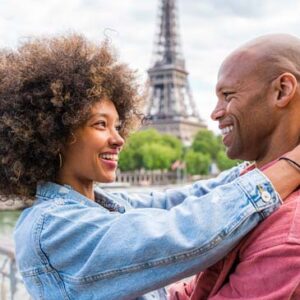 couple rekindling their relationship on a trip to France with Eiffel tower in the background