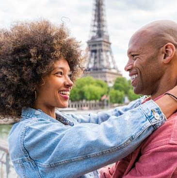 couple rekindling their relationship on a trip to France with Eiffel tower in the background