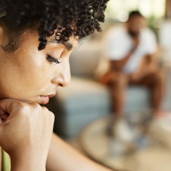 woman looking dejected contemplating forgiving her husband for cheating on her